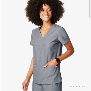 Like new women’s graphite Casma Three pocket scrub top